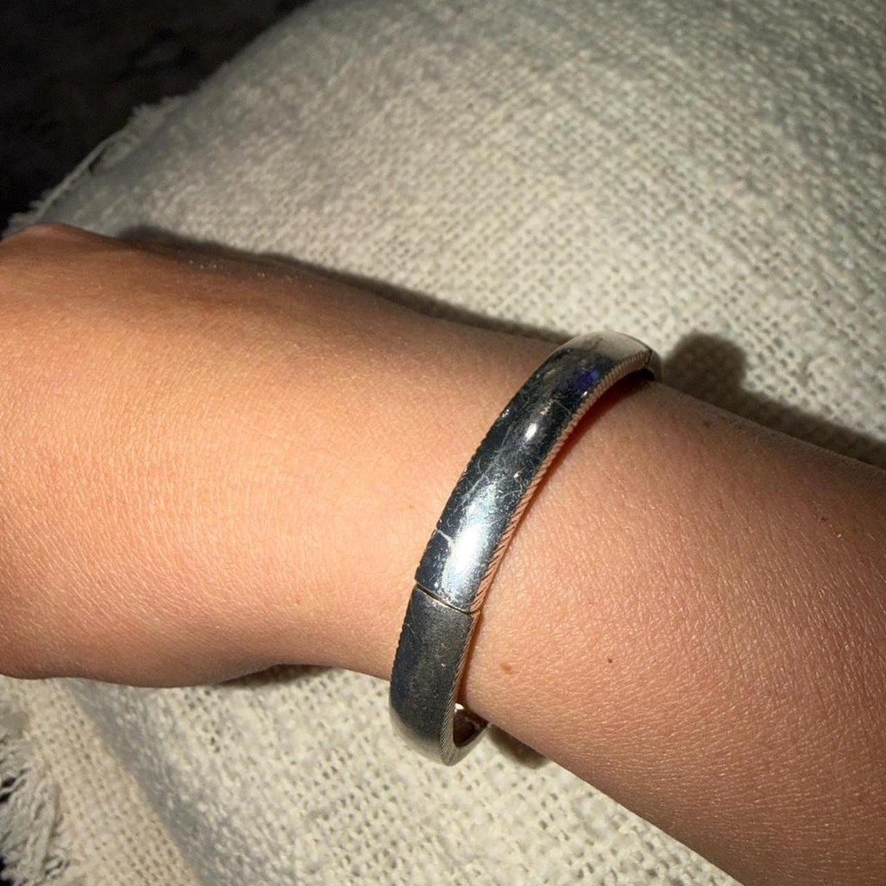 Silver feather bangle bracelet